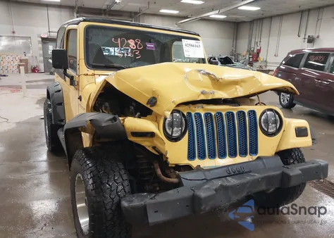 2000 Jeep Wrangler Se z USA, uszkodzony, nr VIN 1J4FA29P7YP767912